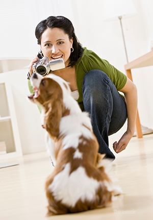 Lady recording her dog