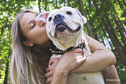 Woman hugging dog