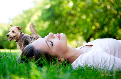 Woman fainted while dog looks on