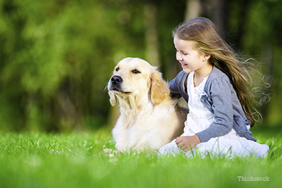 Little girl with dog