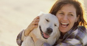 Woman hugging her dog