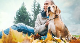 Man outside with dog