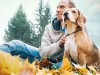 Man outside with dog