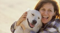 Woman hugging her dog