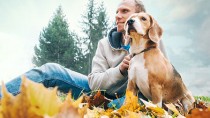 Man outside with dog