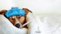 dog in bed, sick with canine influenza: H3N2