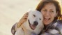 Woman hugging her dog