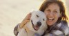 Woman hugging her dog