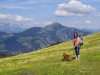 Woman hiking with dog
